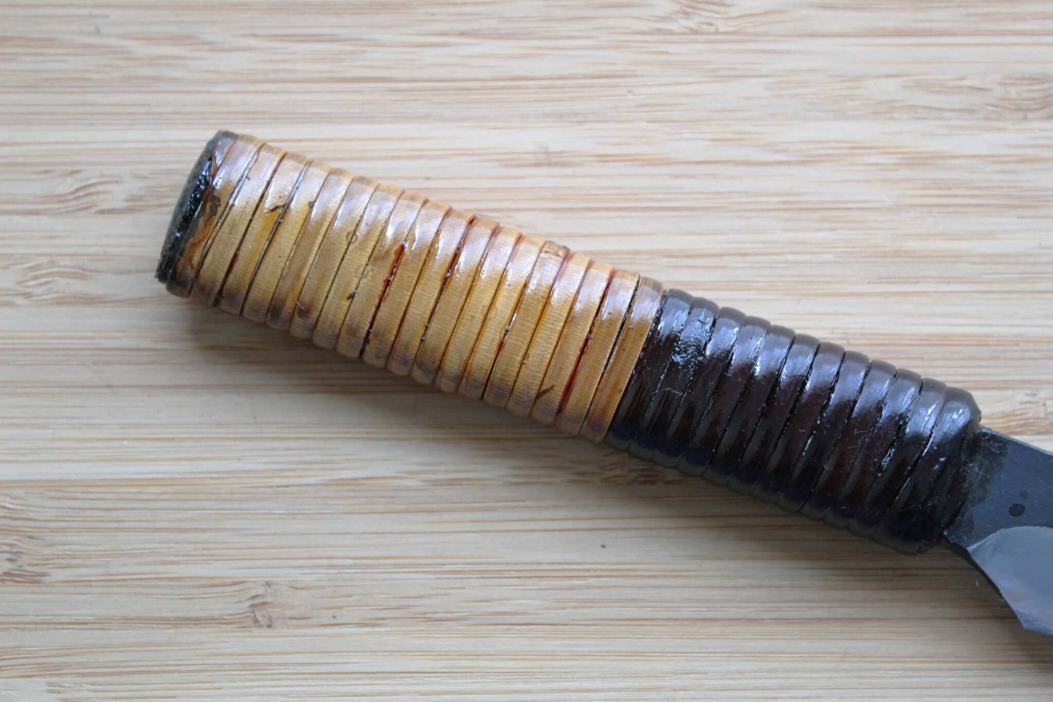 Traditional Fujimaki rattan-wrapped full-tang handle on a 100mm Kyokokaji Shokei knife