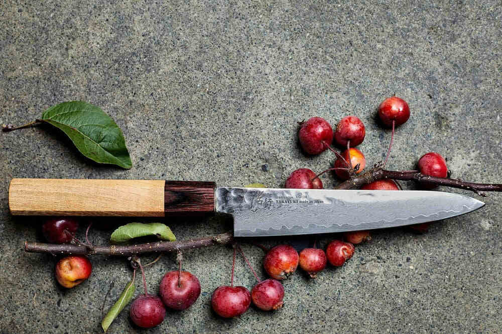 Japanese Chef Knife Gift With Wooden Handle on Red Cherries 