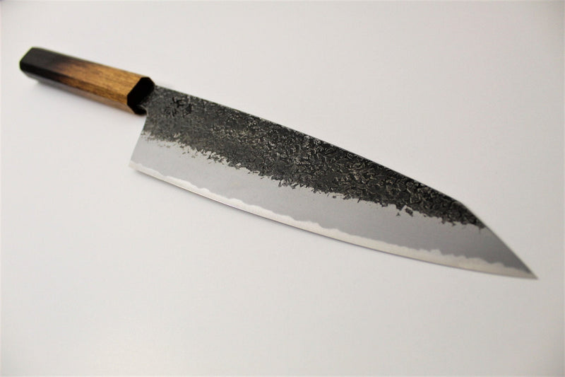 Homura Guren Blue Steel Gyuto vs. Ginga Damascus 69 Layer Gyuto: A Chef’s Comparison