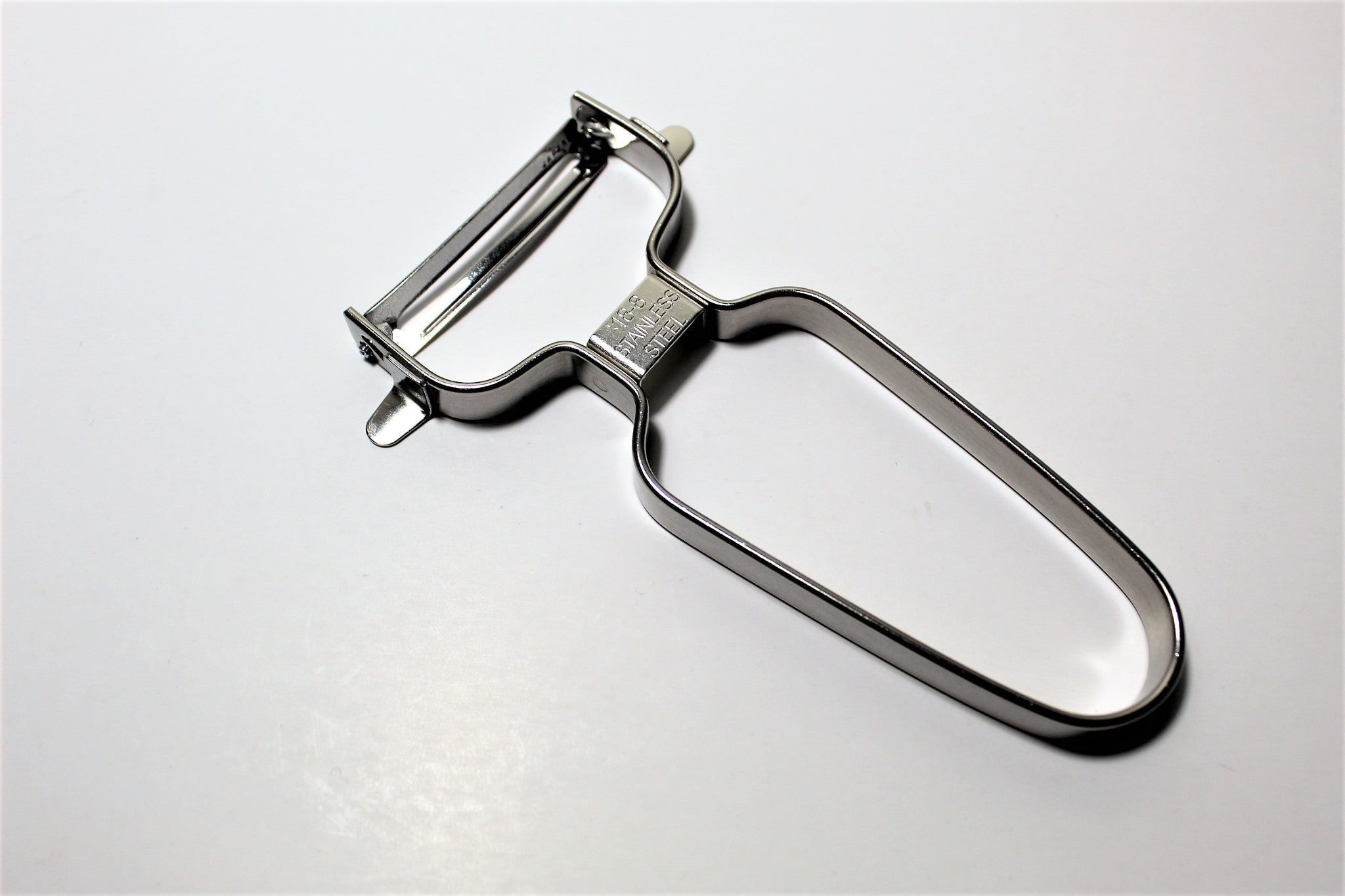 Food Peelers & Corers - Stainless Steel Curved Peeler ACP-695