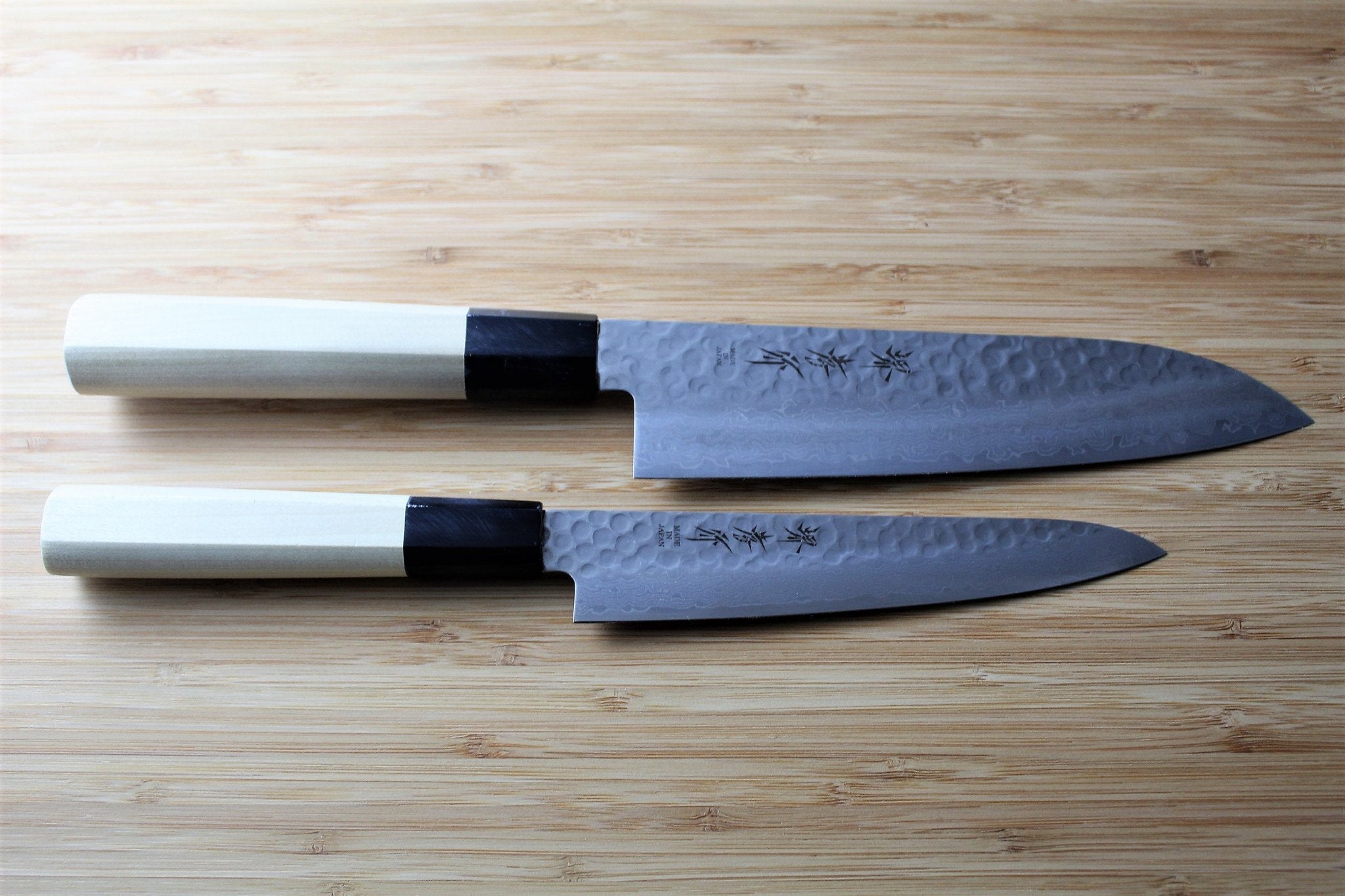 https://hasuseizo.com/cdn/shop/files/kitchen-knives-sakai-takayuki-japanese-knife-set-damascus-45-layer-petty-knife-150mm-5-9-santoku-knife-180mm-7-1-2_4136d87e-edee-475c-ac24-7e0fbe5851e8_5000x.jpg?v=1698700914