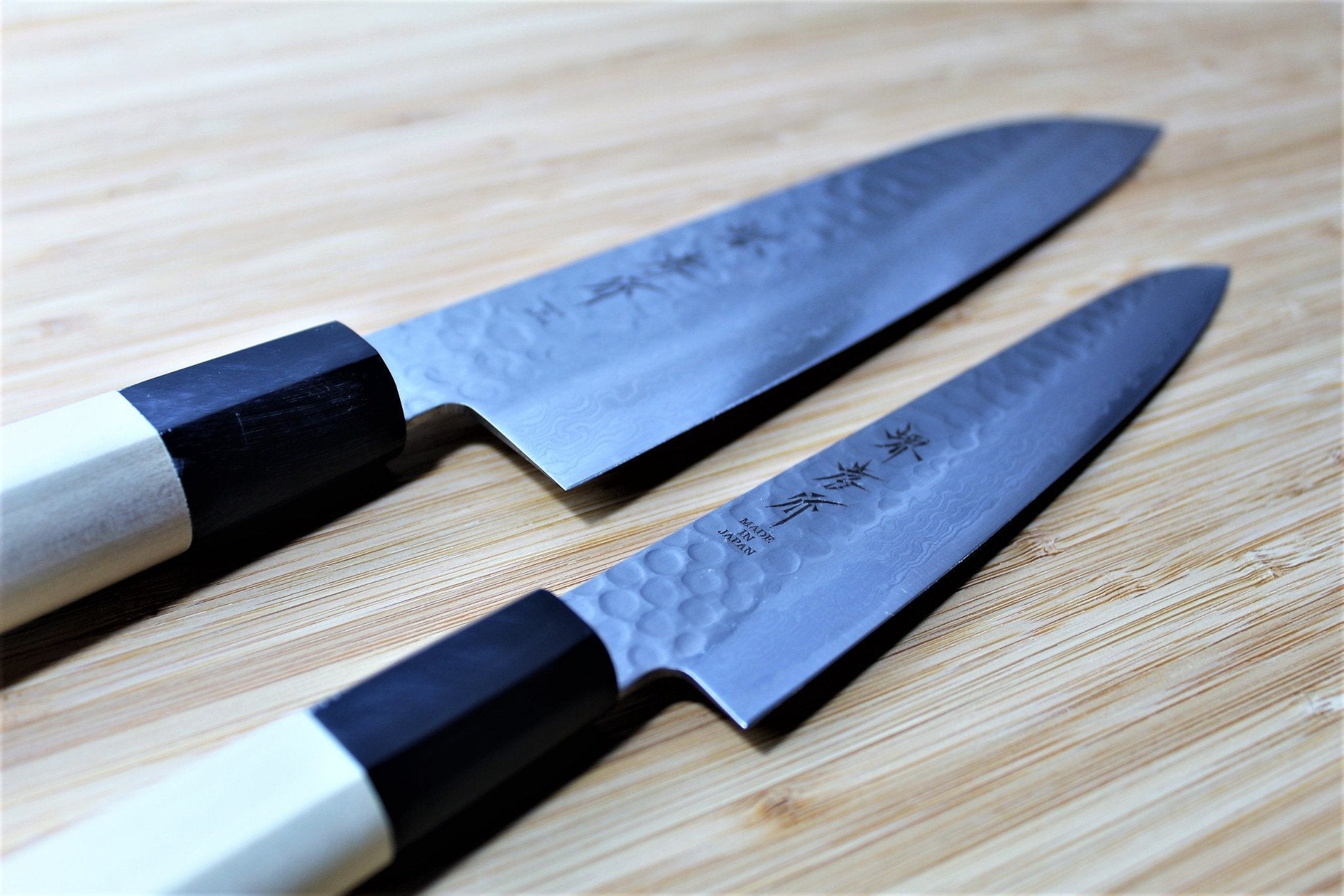 https://hasuseizo.com/cdn/shop/files/kitchen-knives-sakai-takayuki-japanese-knife-set-damascus-45-layer-petty-knife-150mm-5-9-santoku-knife-180mm-7-1-3_f7bc7789-2604-4d92-8396-4f2f7f7a7514_5000x.jpg?v=1698700918