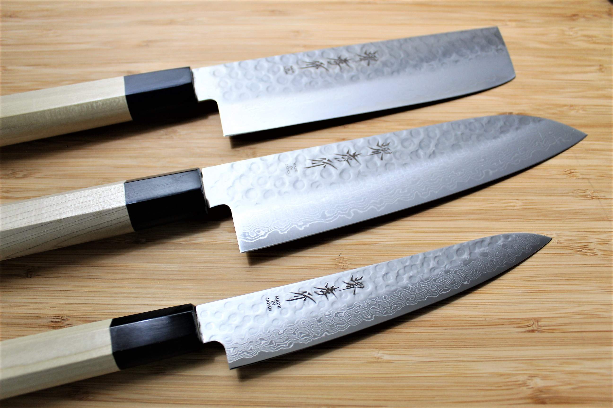 https://hasuseizo.com/cdn/shop/files/kitchen-knives-sakai-takayuki-japanese-knife-set-damascus-45-layer-petty-knife-150mm-5-9-santoku-knife-180mm-7-1-nakiri-knife-160mm-6-3-3_39235658-ea69-4d8f-9e22-11c21f54ff81_5000x.jpg?v=1698702857
