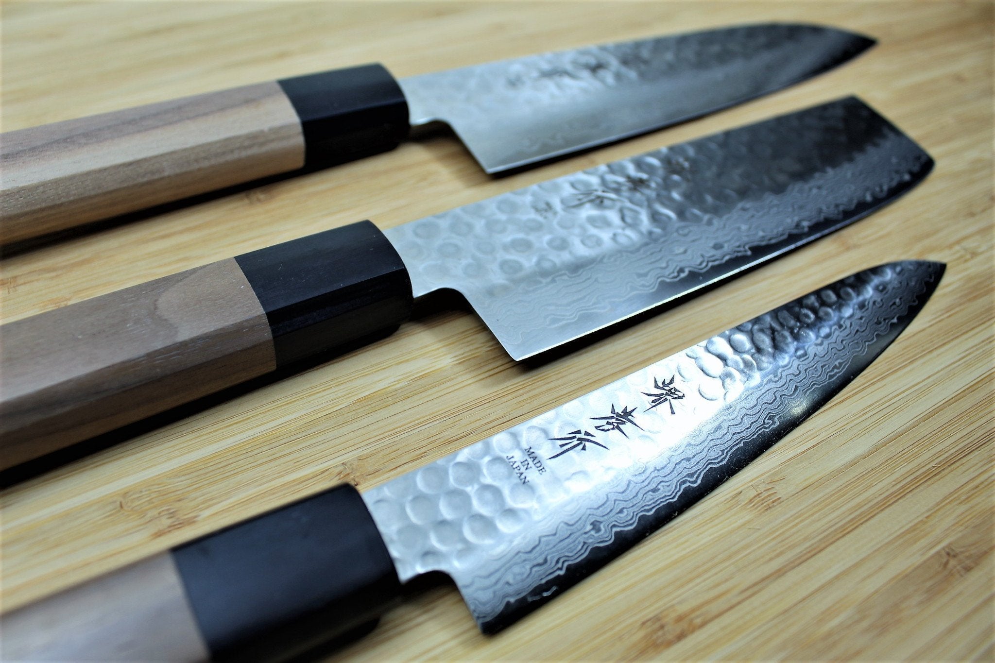 https://hasuseizo.com/cdn/shop/files/kitchen-knives-sakai-takayuki-japanese-knife-set-damascus-45-layer-with-walnut-handle-petty-knife-150mm-5-9-santoku-knife-180mm-7-1-nakiri-knife160-mm-6-2-3_7dba96b2-4cdb-4c59-ab2d-741625e1f065_5000x.jpg?v=1698700896