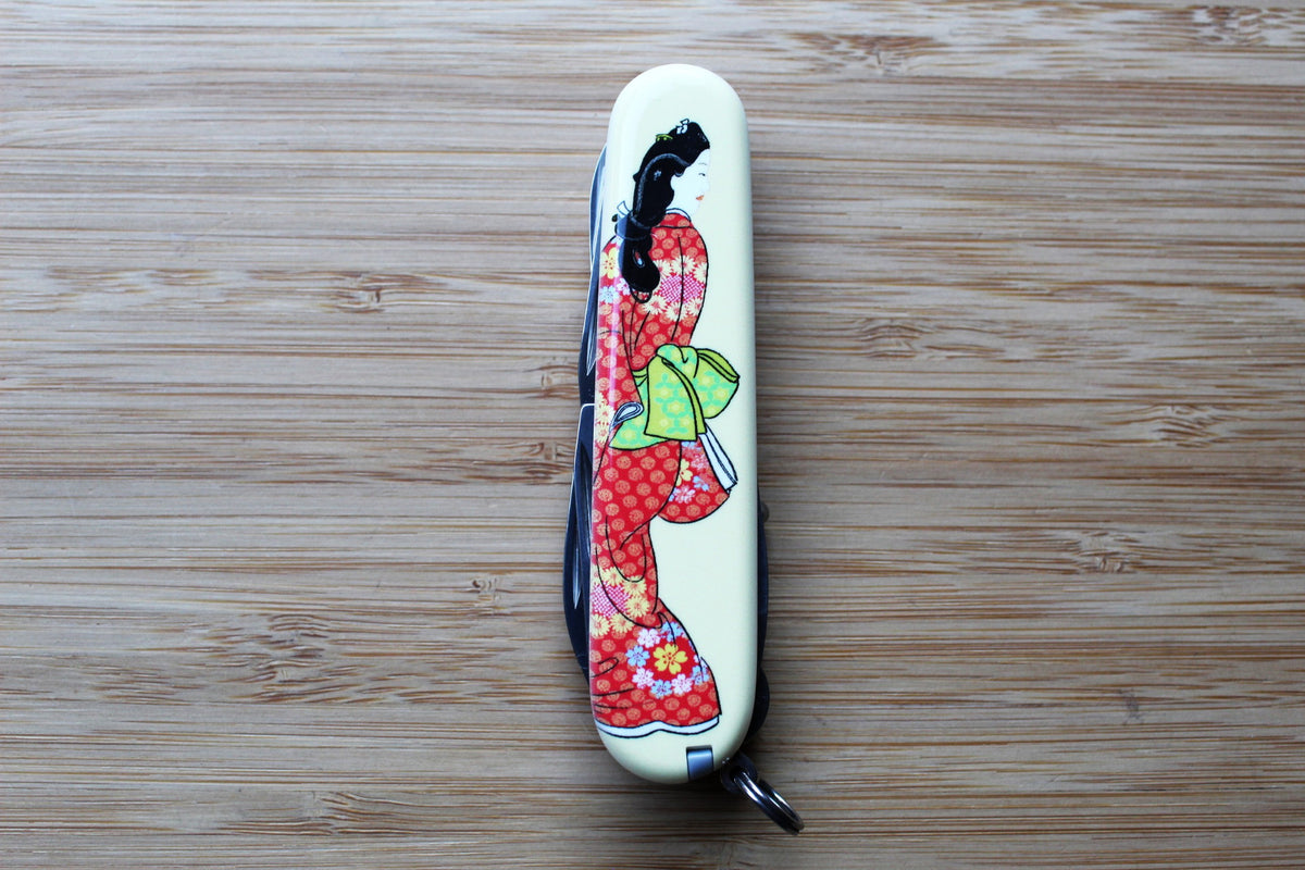 Victorinox Climber 91mm Swiss Army Knife closed, showing Japanese Ukiyo-e Mikaeri Bijin-zu artwork depicting a classical woman looking over her shoulder